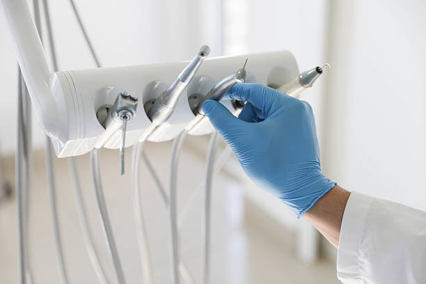 Professional Tooth Extraction technician working in Providence Village, TX